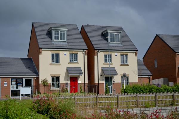 Two newly built detached brick houses