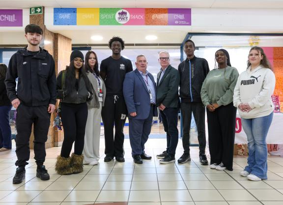Young people with Cllr Andrew and West Midlands Mayor Richard Parker standing outside Your Place