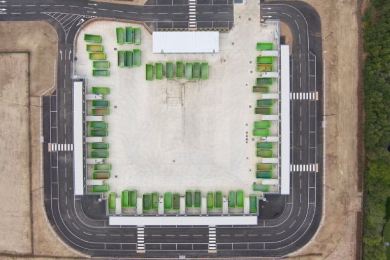 Aerial view of the access road and recycling bays arranged in a square