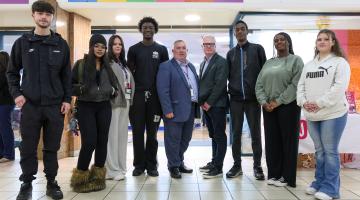 Young people with Cllr Andrew and West Midlands Mayor Richard Parker standing outside Your Place